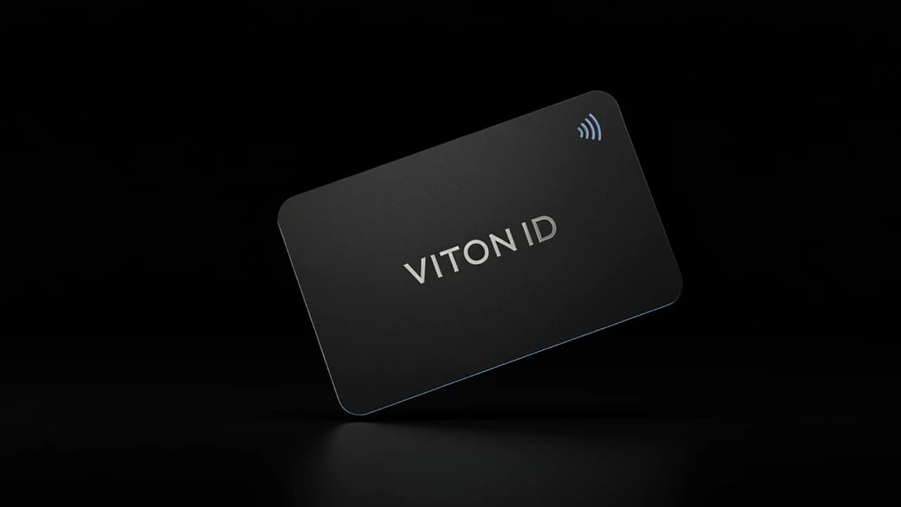 Black metal VITON ID card with a blue contactless mark, floating on black